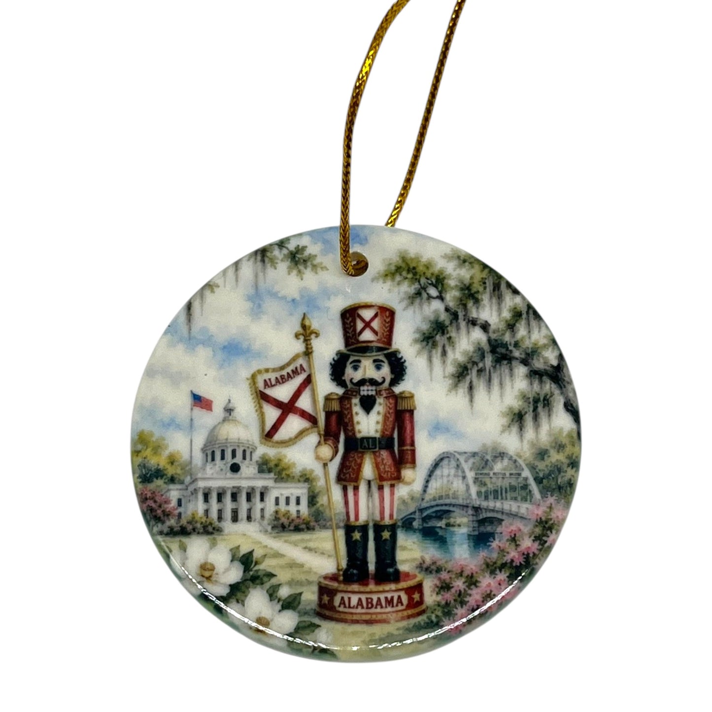 Alabama Nutcracker 3 inch porcelain Christmas ornament with Alabama state flag, capitol, bridge, magnolia blossoms and Southern scenery