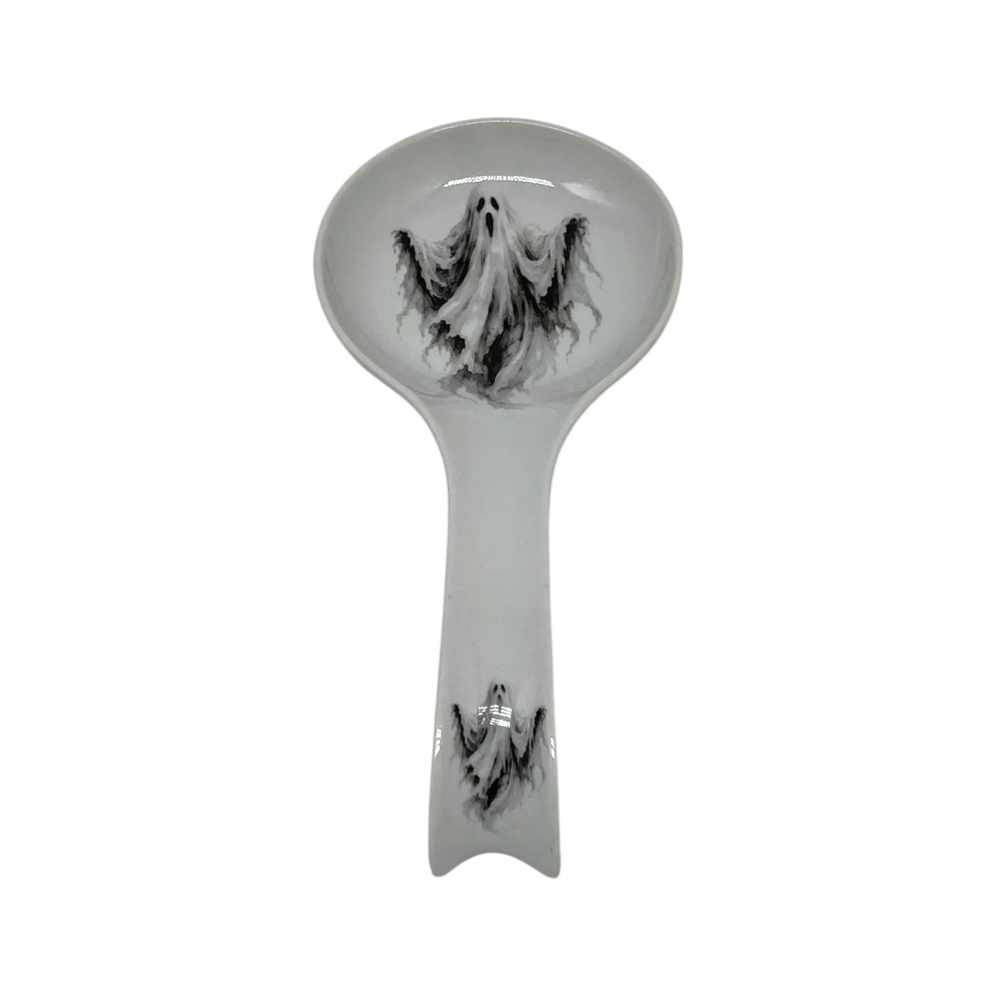 Haunted Spirit Halloween long spoon rest featuring flowing black-and-white ghost artwork on the bowl and handle