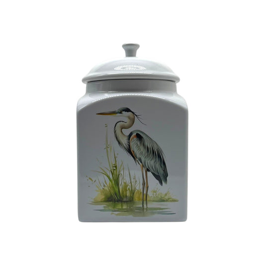White square stoneware canister with an airtight lid and kiln-fired graceful blue heron design, decorated in New Iberia, Louisiana.