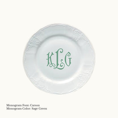 White 6¾-inch Bernadotte porcelain bread and butter plate with an embossed rim and Carson three-letter monogram in Sage Green.