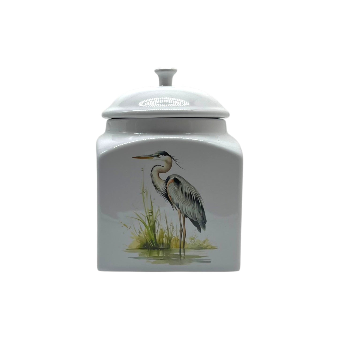 White square stoneware canister with an airtight lid and kiln-fired graceful blue heron design, decorated in New Iberia, Louisiana.