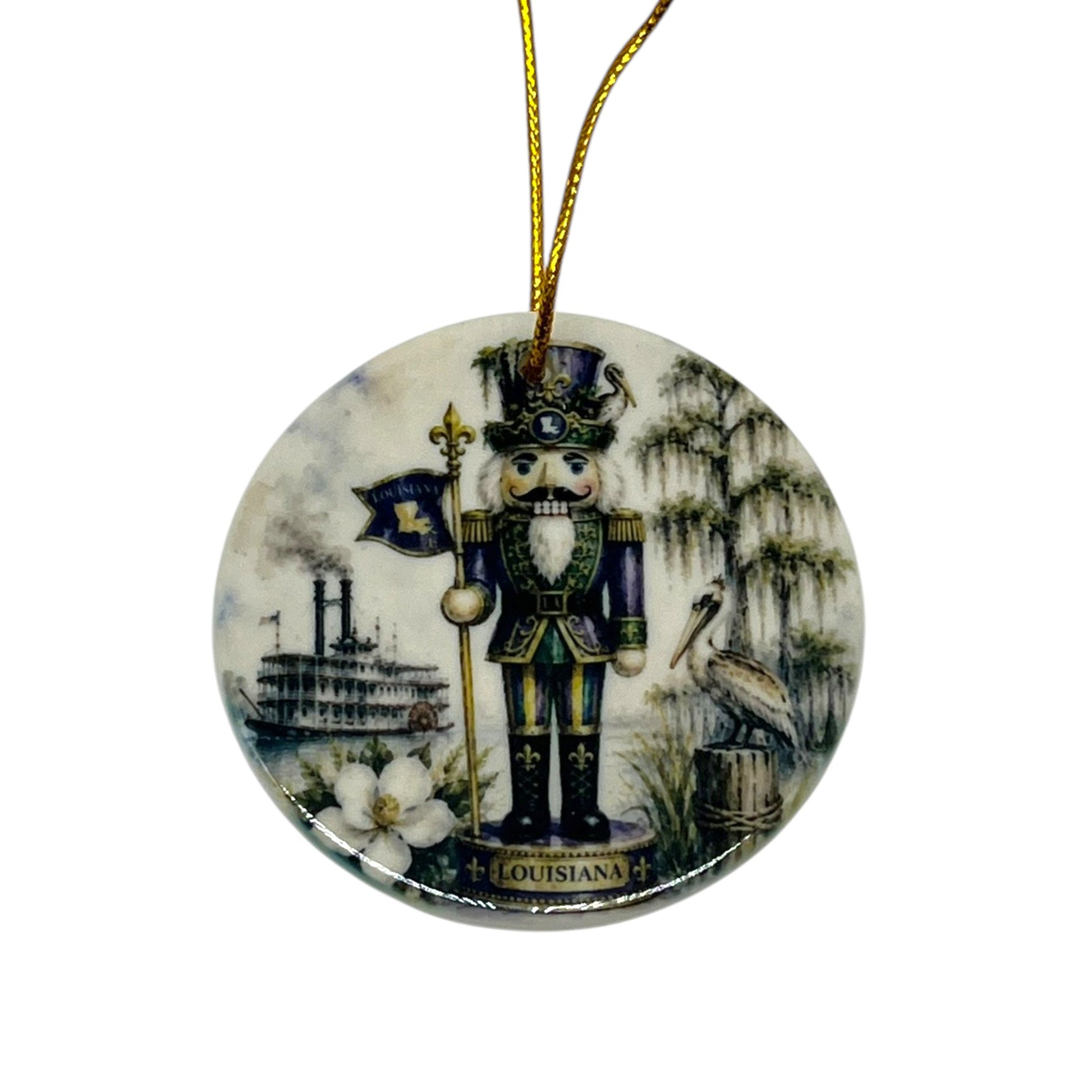 Louisiana Nutcracker 3 inch porcelain Christmas ornament with riverboat, pelican, magnolia, fleur-de-lis and moss-draped Louisiana scenery