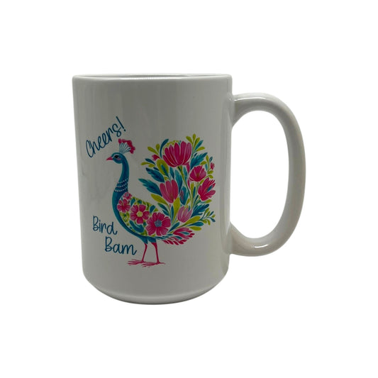 Fancy Bird Bam Mahjong 15 ounce white mug with colorful floral peacock-inspired bird, Cheers lettering and Bird Bam design